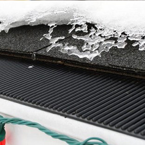 gutter guard and roof with ice