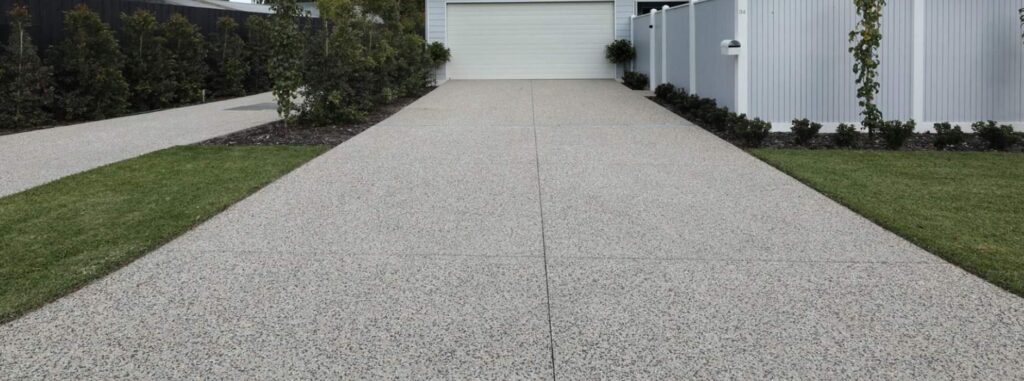 Why Your Driveway & Walkways Need Pressure Washing This Summer